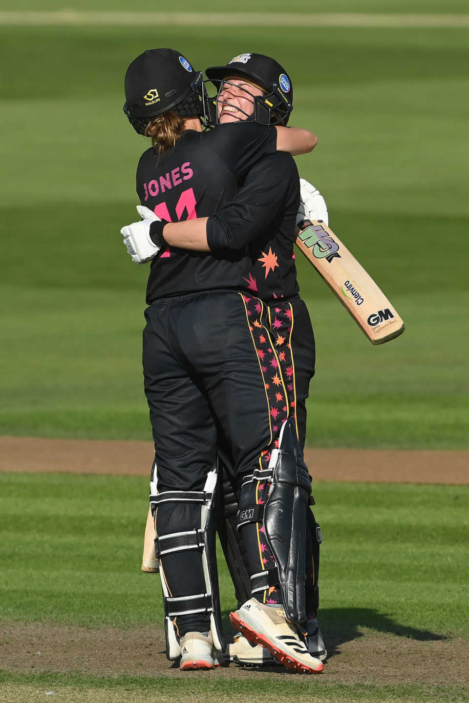 Marie Kelly celebrates with team-mate Eve Jones, Charlotte Edwards Cup, Southern Vipers vs Central Sparks, Hove, August 25, 2021