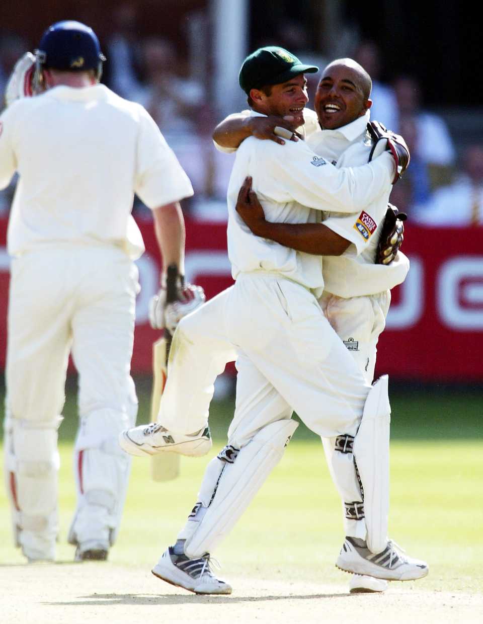 Paul Adams and Mark Boucher celebrate a wicket
