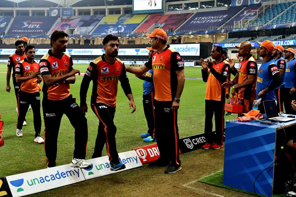 VVS Laxman gives Rashid Khan a pat on the back as the players walk back to the dugout, Rajasthan Royals vs Sunrisers Hyderabad, IPL 2020, Dubai, October 22, 2020