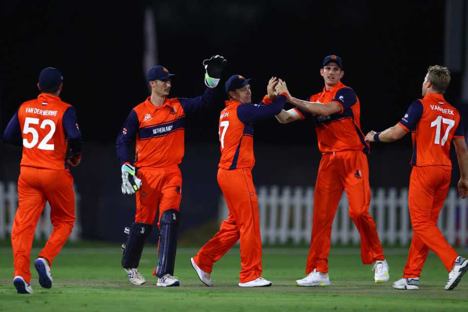 Stephan Myburgh celebrates with captain Pieter Seelaar after the fall of a wicket