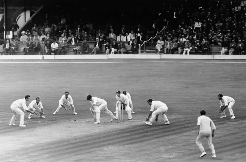 From left: Ted Dexter, John Edrich, Tom Graveney, Alan Knott, Colin Cowddrey, Colin Milburn and Basil D'Oliveira surround Ashley Mallett as he bats, England v Australia, 5th Test, The Oval, 5th day, August 27, 1968