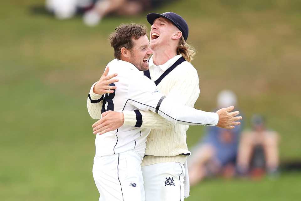 Jon Holland and Will Sutherland celebrate the final wicket