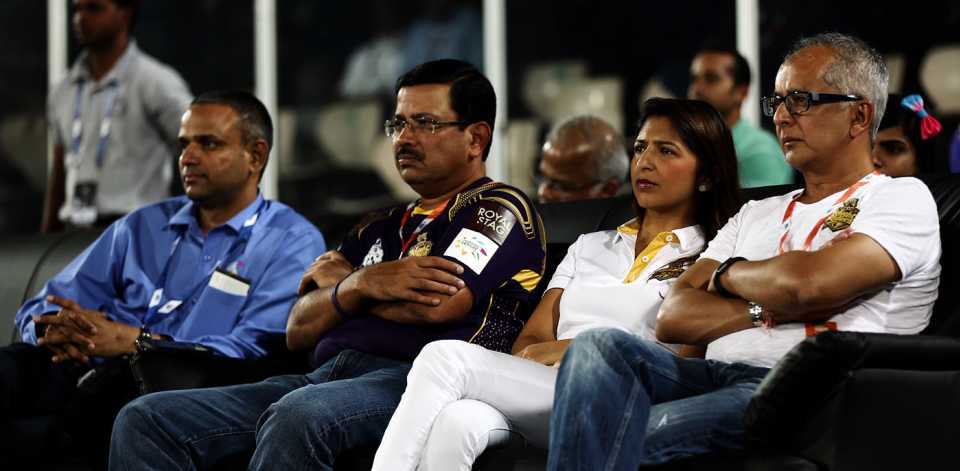 IPL COO Sundar Raman (left) watches the match with Venky Mysore (second from left) and Jay Mehta (right) of the Kolkata Knight Riders management