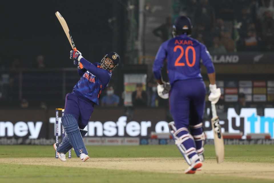 Rishabh Pant slams the ball away for the winning hit