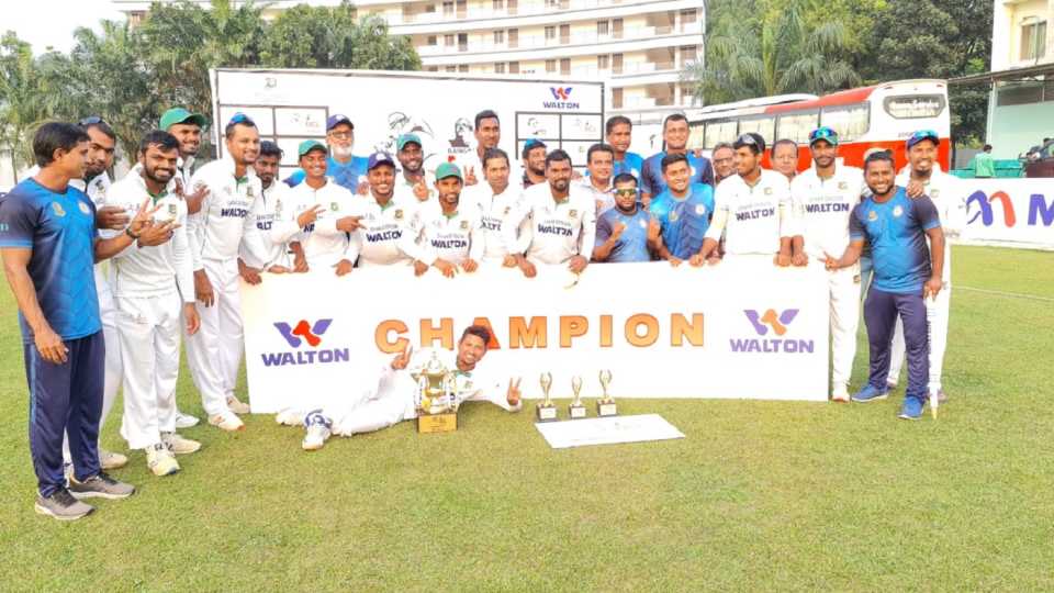 Dhaka's players celebrate with the NCL tier-1 trophy, National Cricket League 2021-22, Savar, November 24, 2021