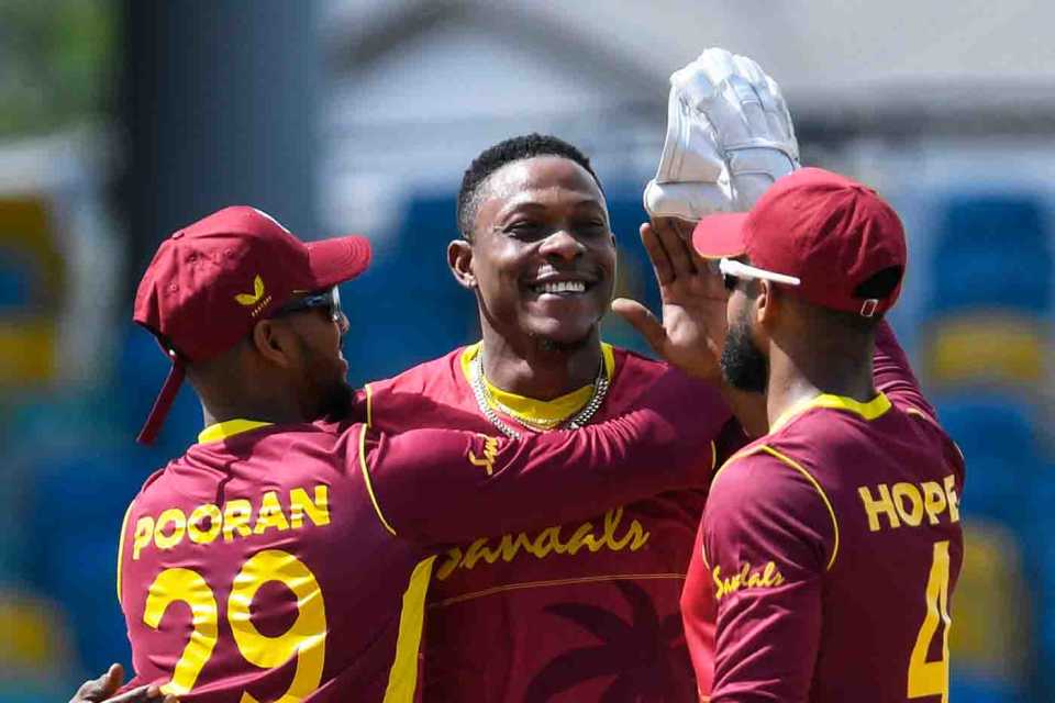 Sheldon Cottrell celebrates a wicket with Nicholas Pooran and Shai Hope, West Indies vs Australia, 2nd ODI, Barbados, July 24, 2021
