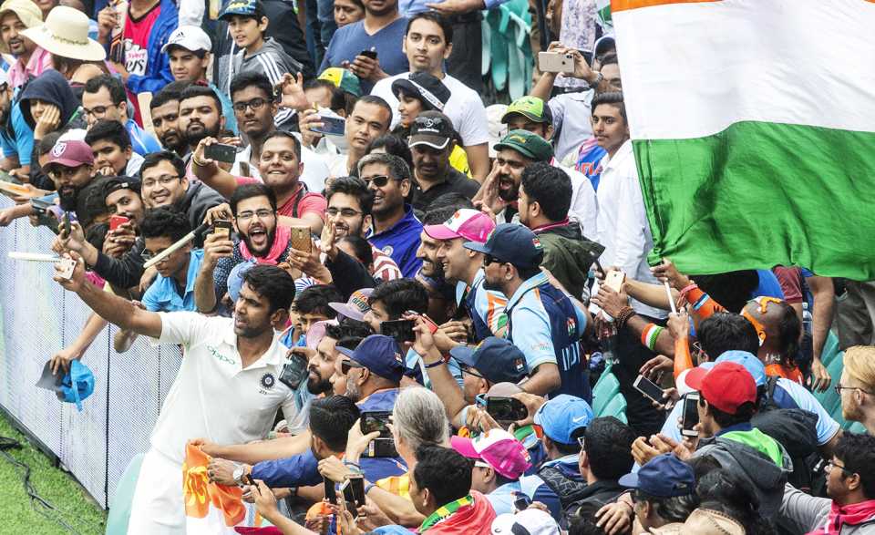 R Ashwin takes a selfie with fans