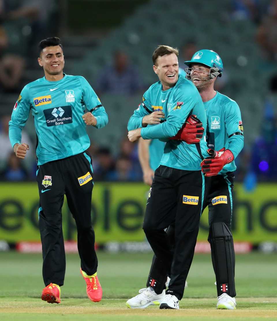 Jimmy Peirson embraces Matt Kuhnemann after he claimed the wicket of George Garton, Adelaide Strikers vs Brisbane Heat, BBL 2021, December 23, 2021, Adelaide