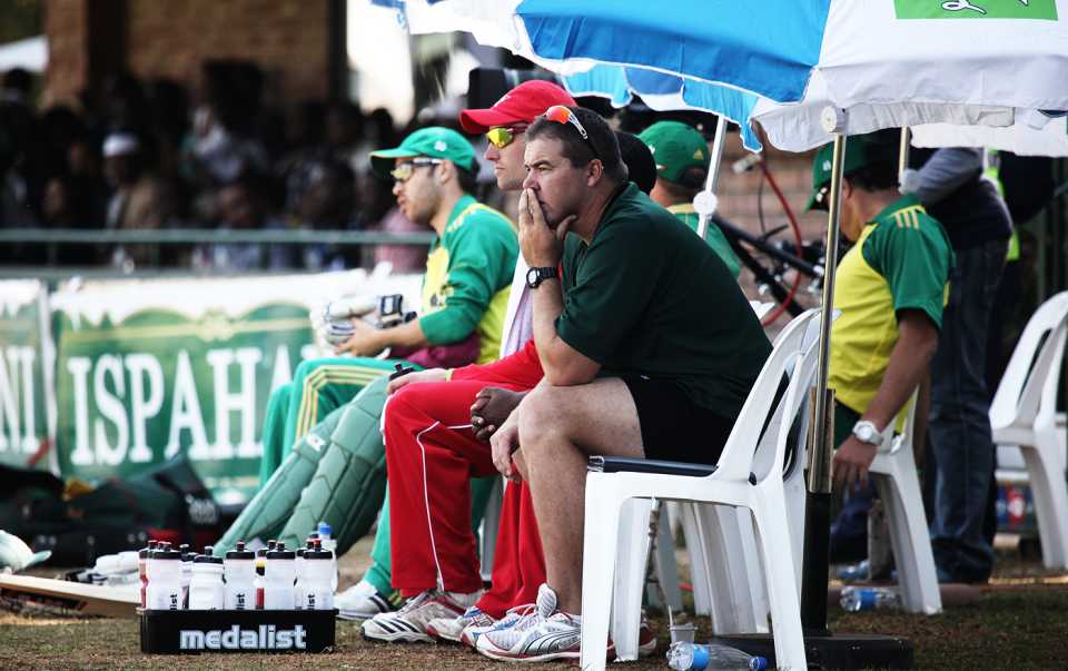 Heath Streak watches the match from the sidelines