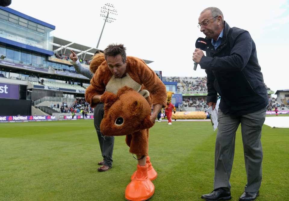 Michael Vaughan is interviewed by David Lloyd as he takes part in the mascot race,  T20 Blast finals day, Edgbaston, August 23, 2014