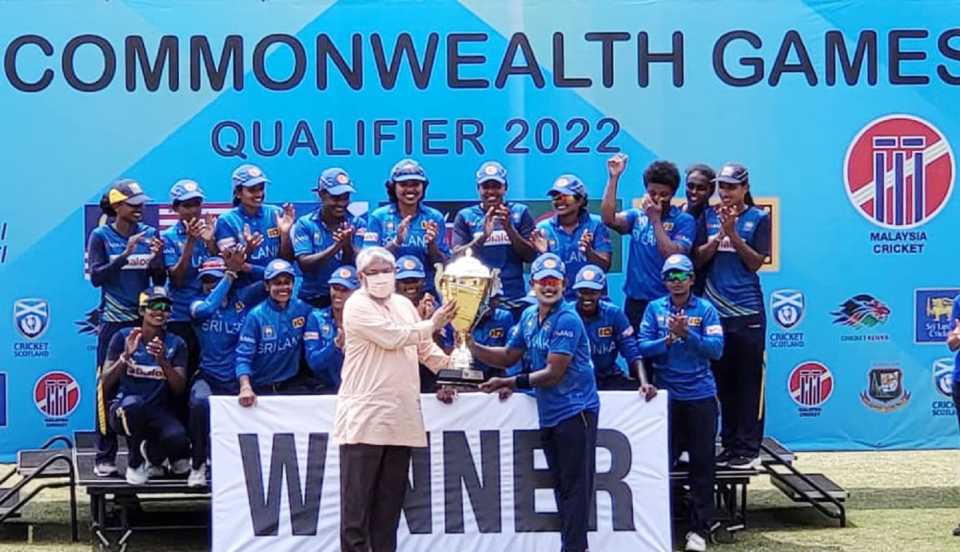 Sri Lanka captain Chamari Athapaththu receives the winners' trophy for the 2022 Commonwealth Games Qualifier