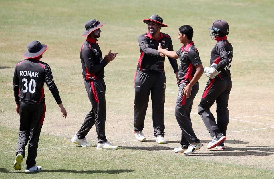 Adhithya Shetty celebrates a wicket with his team-mates, Uganda Under-19 vs UAE Under-19, Under-19 World Cup, Port of Spain, January 25, 2022