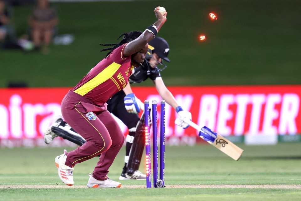 Deandra Dottin breaks the stumps to run Fran Jonas out and seal West Indies' win