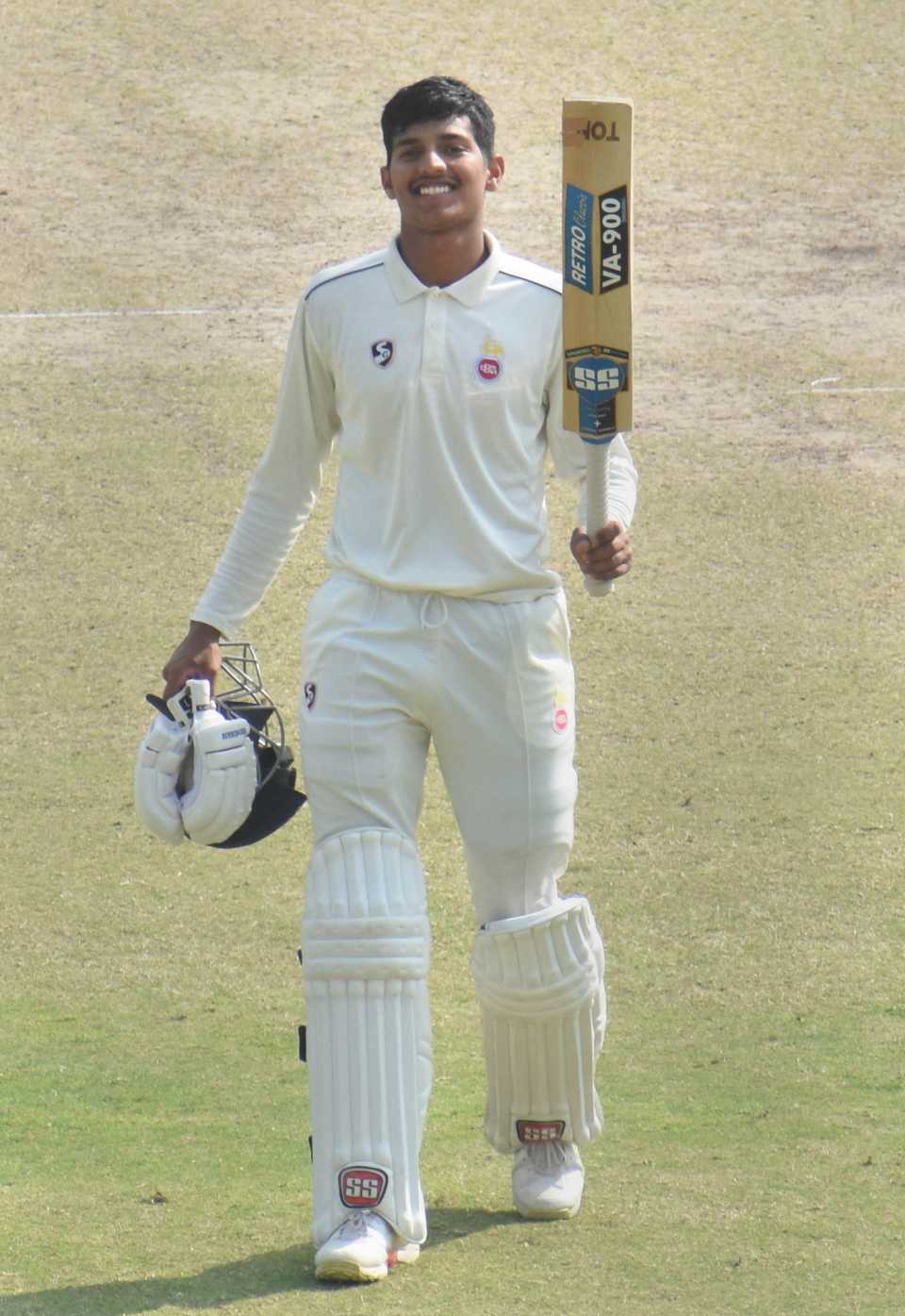 Yash Dhull raises his bat after reaching a double-century, Chhattisgarh vs Delhi, Ranji Trophy 2021-22, 4th day, Guwahati, March 6, 2022