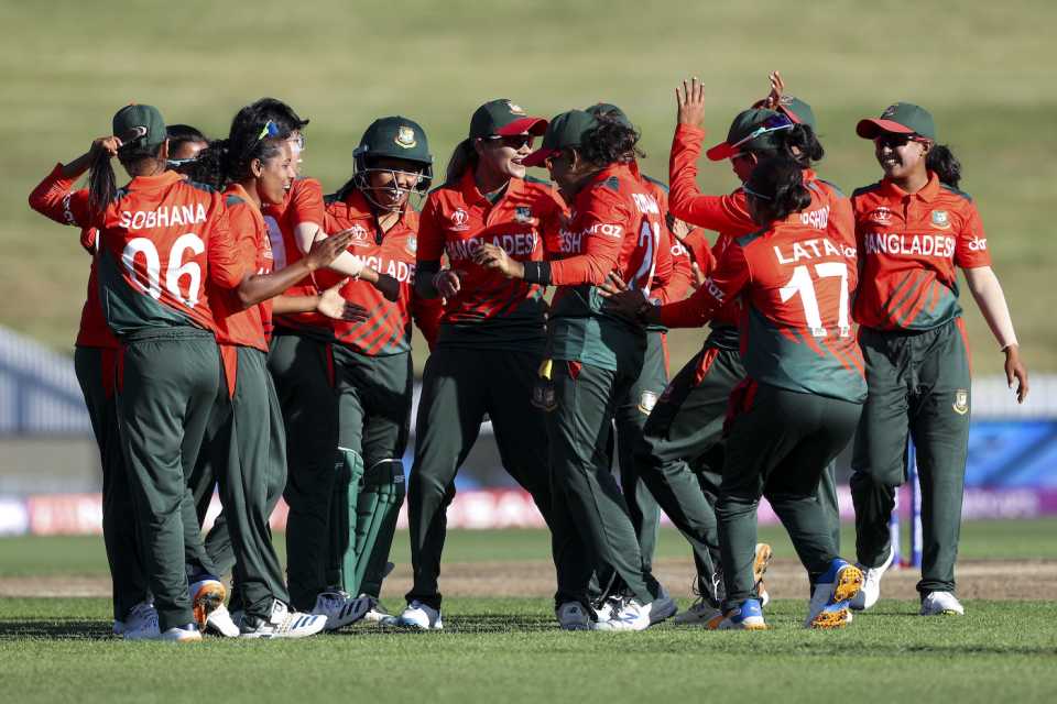 The Bangladesh players celebrate after notching up their maiden win in ODI World Cups