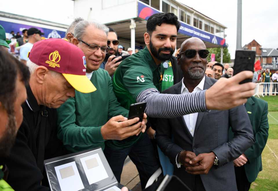 Viv Richards poses for pictures with fans