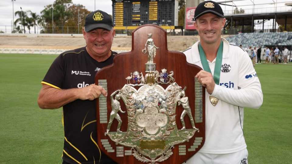 Father and son - Shaun and Geoff Marsh pose with the Sheffield Shield title