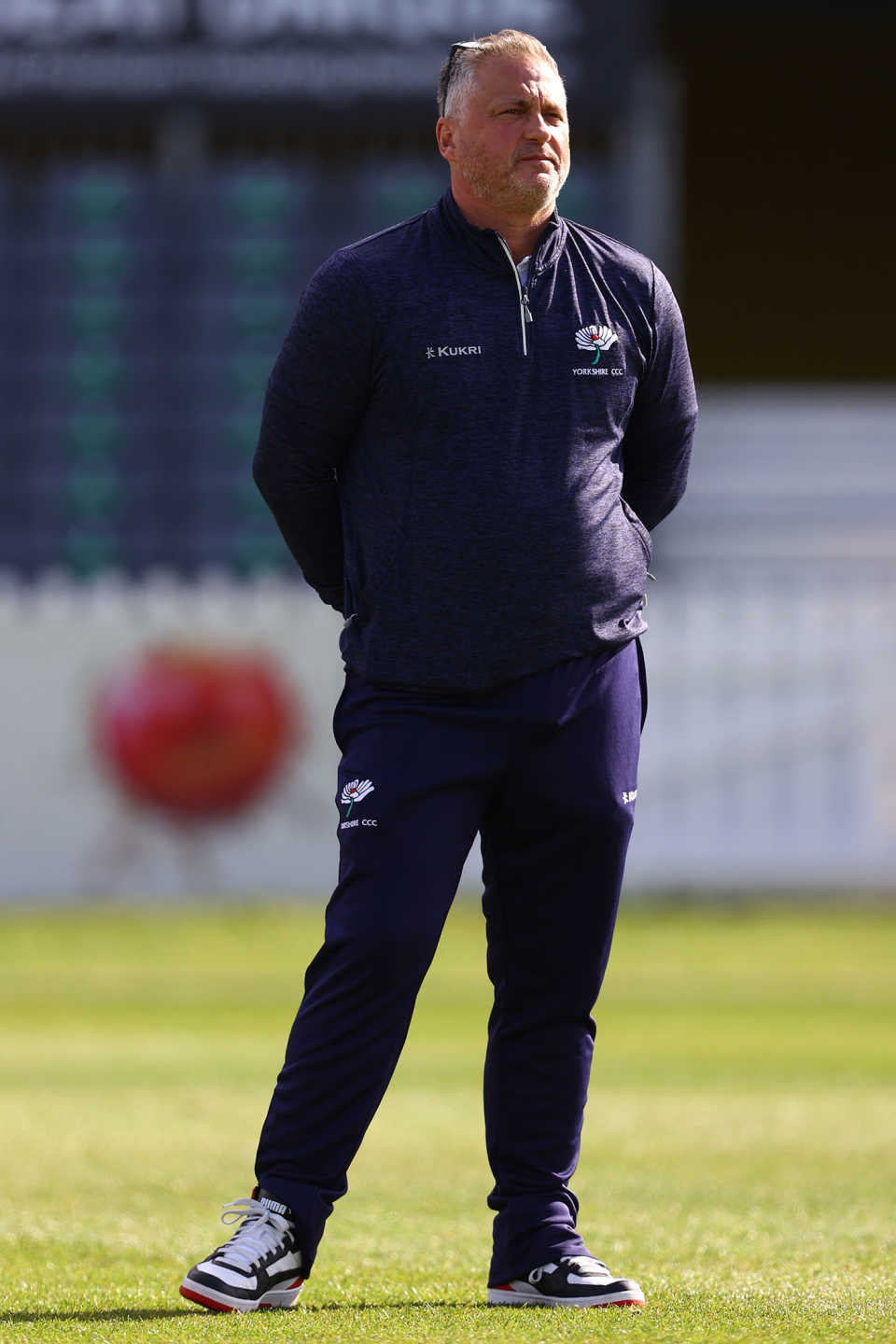 Darren Gough, Yorkshire's interim managing director of cricket, watches players warm up in Bristol 