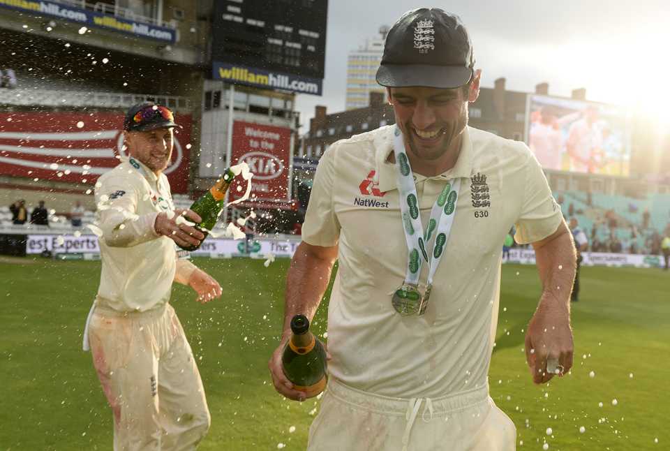 Joe Root pours champagne on Alastair Cook