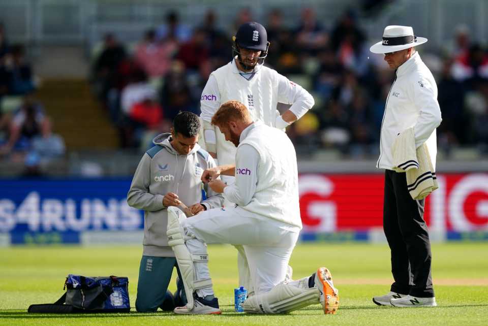 Jonny Bairstow receives medical attention