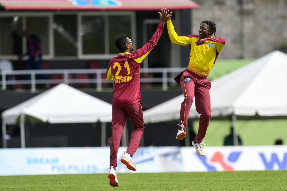 Hayden Walsh Jr and Akeal Hosein in lofty celebrations, West Indies vs Bangladesh, 1st T20I, Roseau, July 2, 2022
