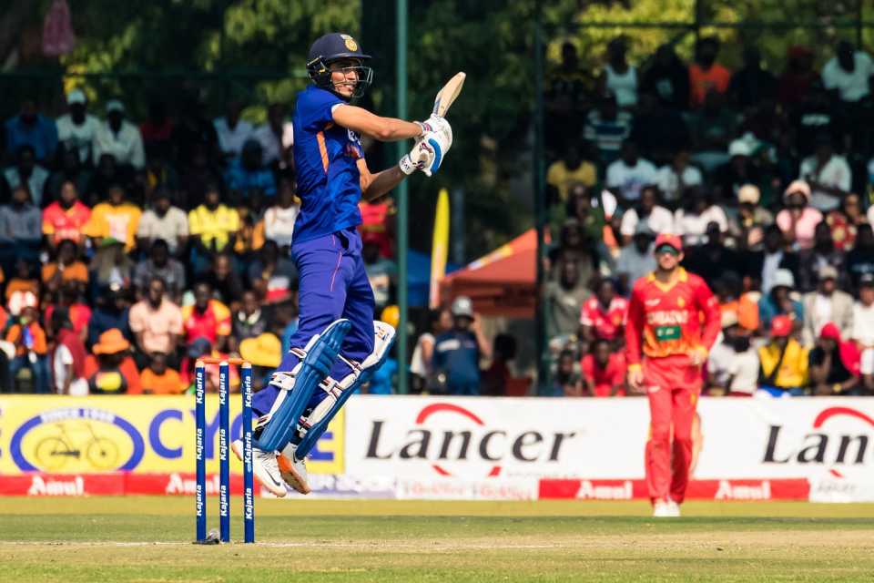 An airborne Shubman Gill hits through the off side