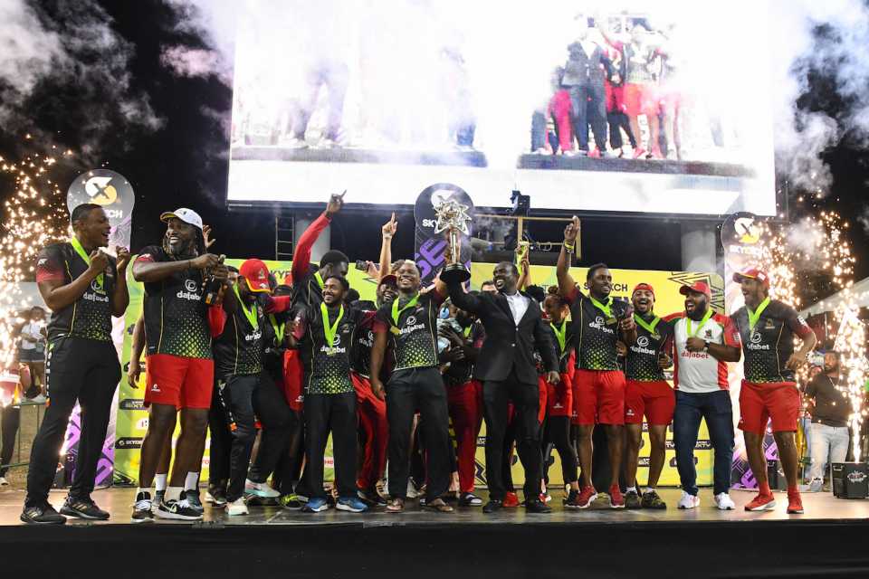 Saint Kitts & Nevis Patriots players with the men's 6ixty trophy after winning the final against Trinbago Knight Riders