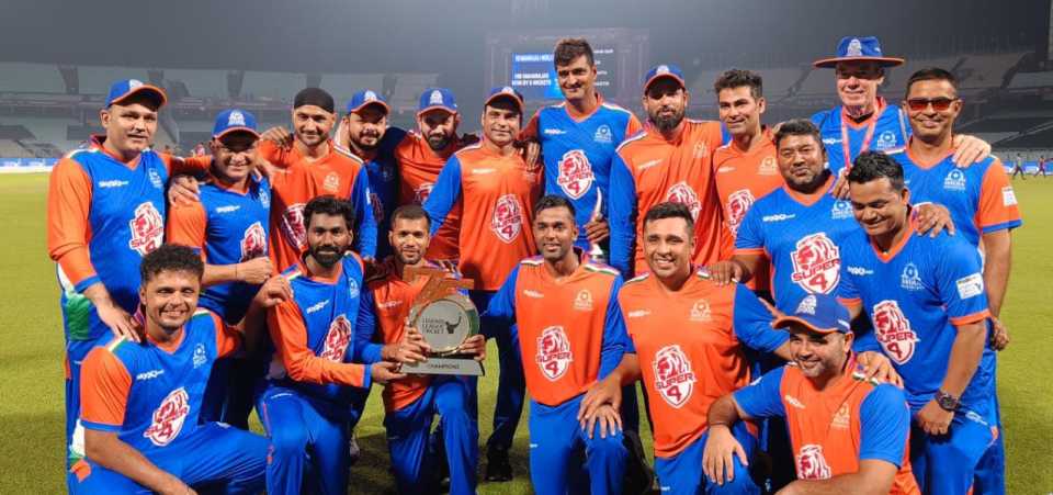 The India Maharajas squad poses with the trophy after beating World Giants