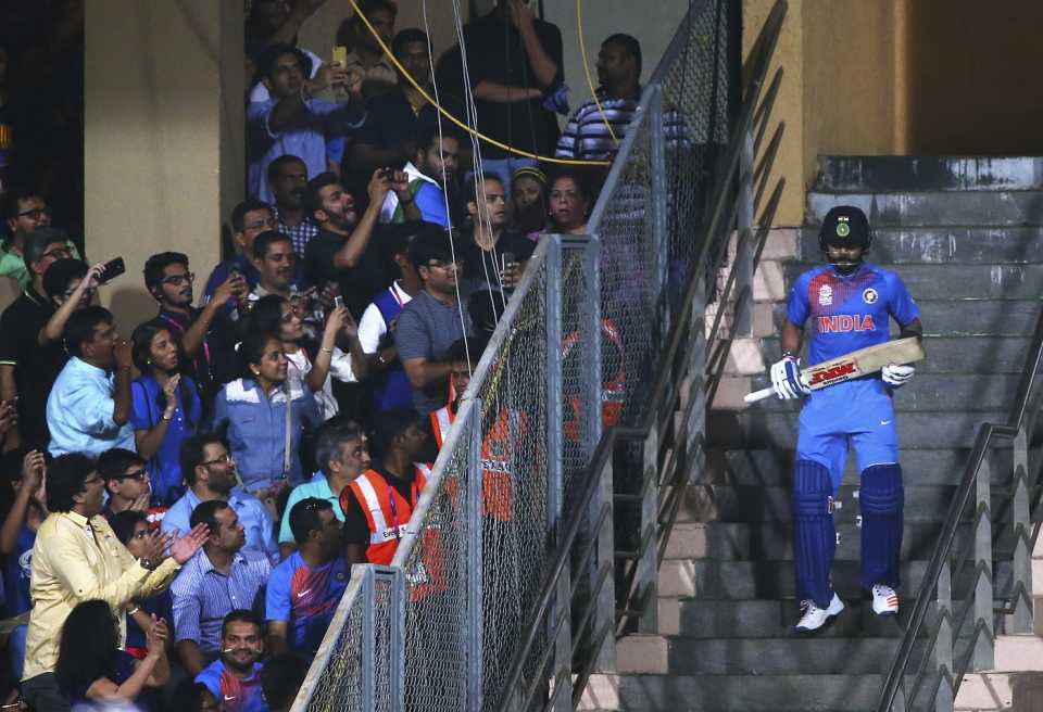 Virat Kohli walks out to bat at the Wankhede Stadium