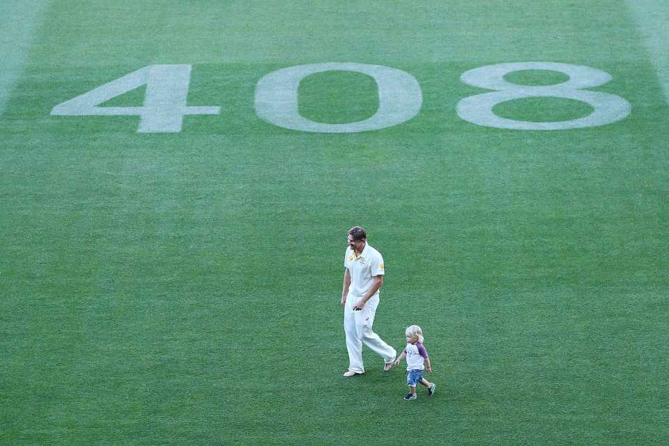 Shane Watson takes a walk with his son Will after Australia's win, Australia v India, 1st Test, Adelaide, 5th day, December 13, 2014