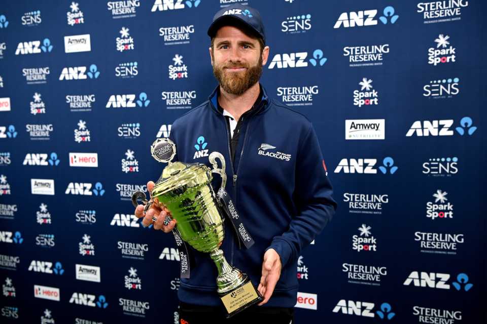 Kane Williamson poses with the trophy after New Zealand won the ODI series