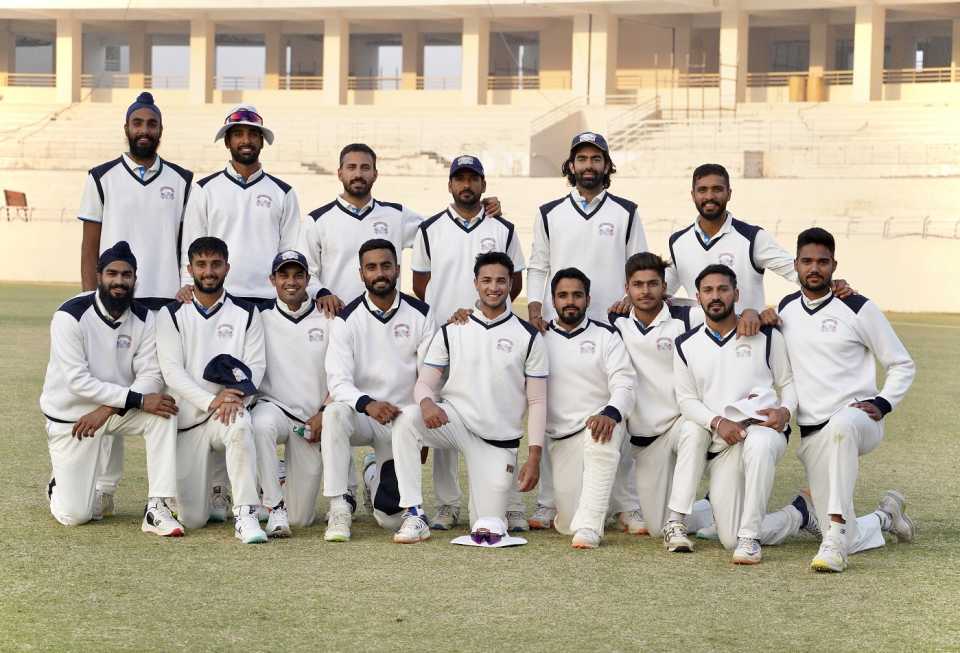 The Punjab players pose after the match