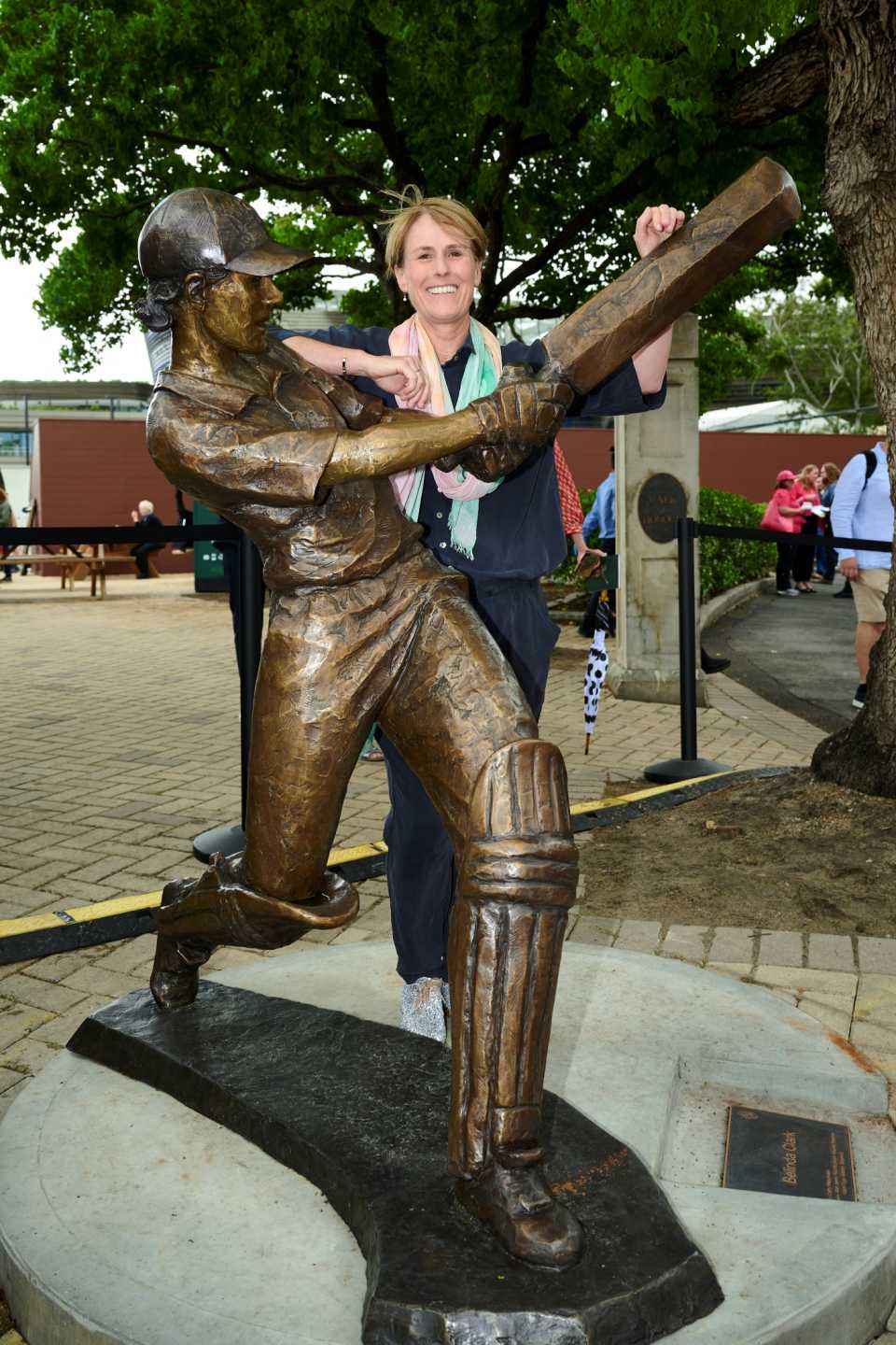 Belinda Clark poses with her newly unveiled statue at the SCG