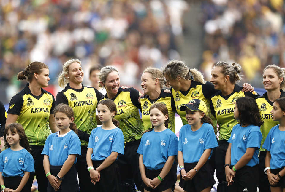 The Australian players share a laugh as the line up for the national anthems, Australia v India, final, Women's T20 World Cup, Melbourne, March 8, 2020