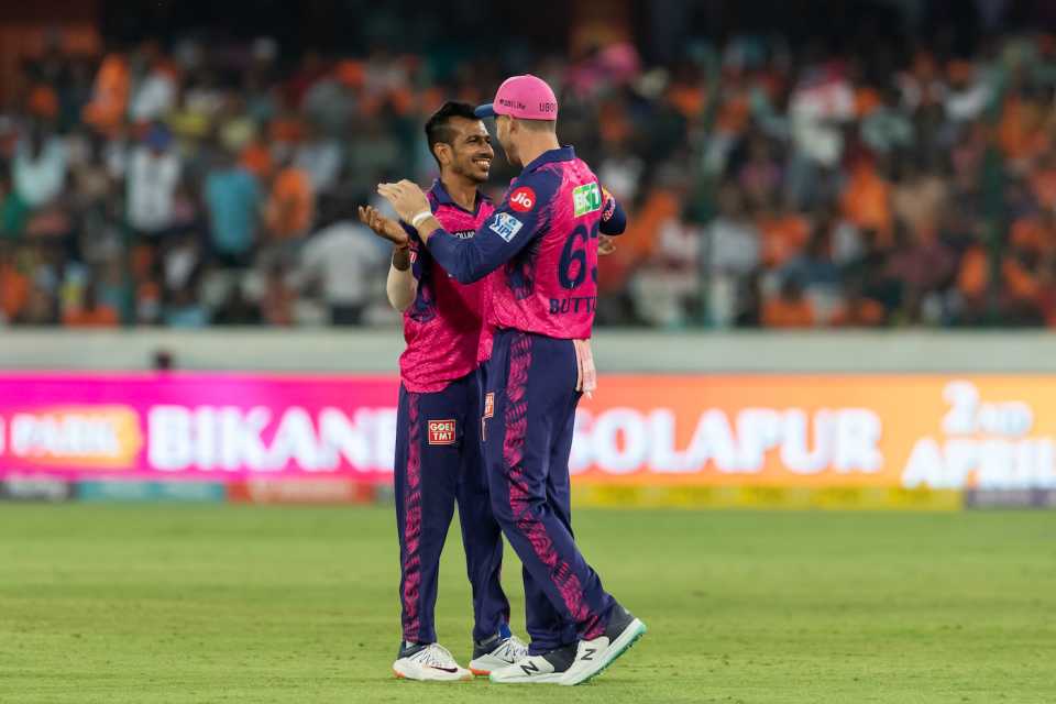 Yuzvendra Chahal and Jos Buttler celebrate a wicket