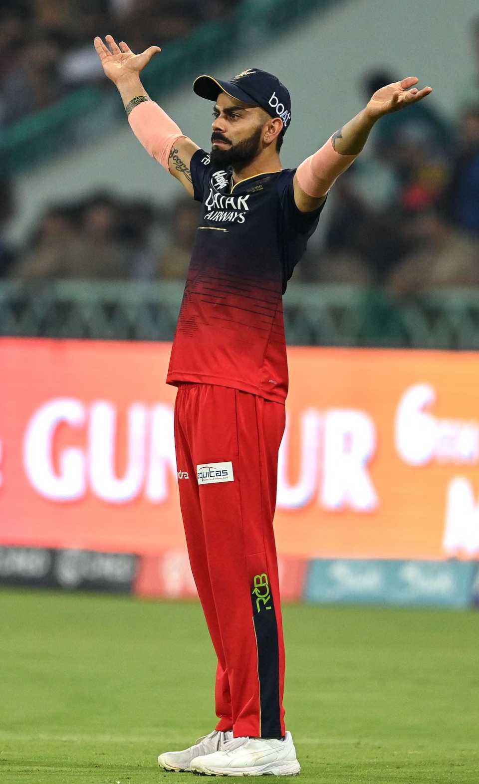 Virat Kohli gestures while out at the boundary