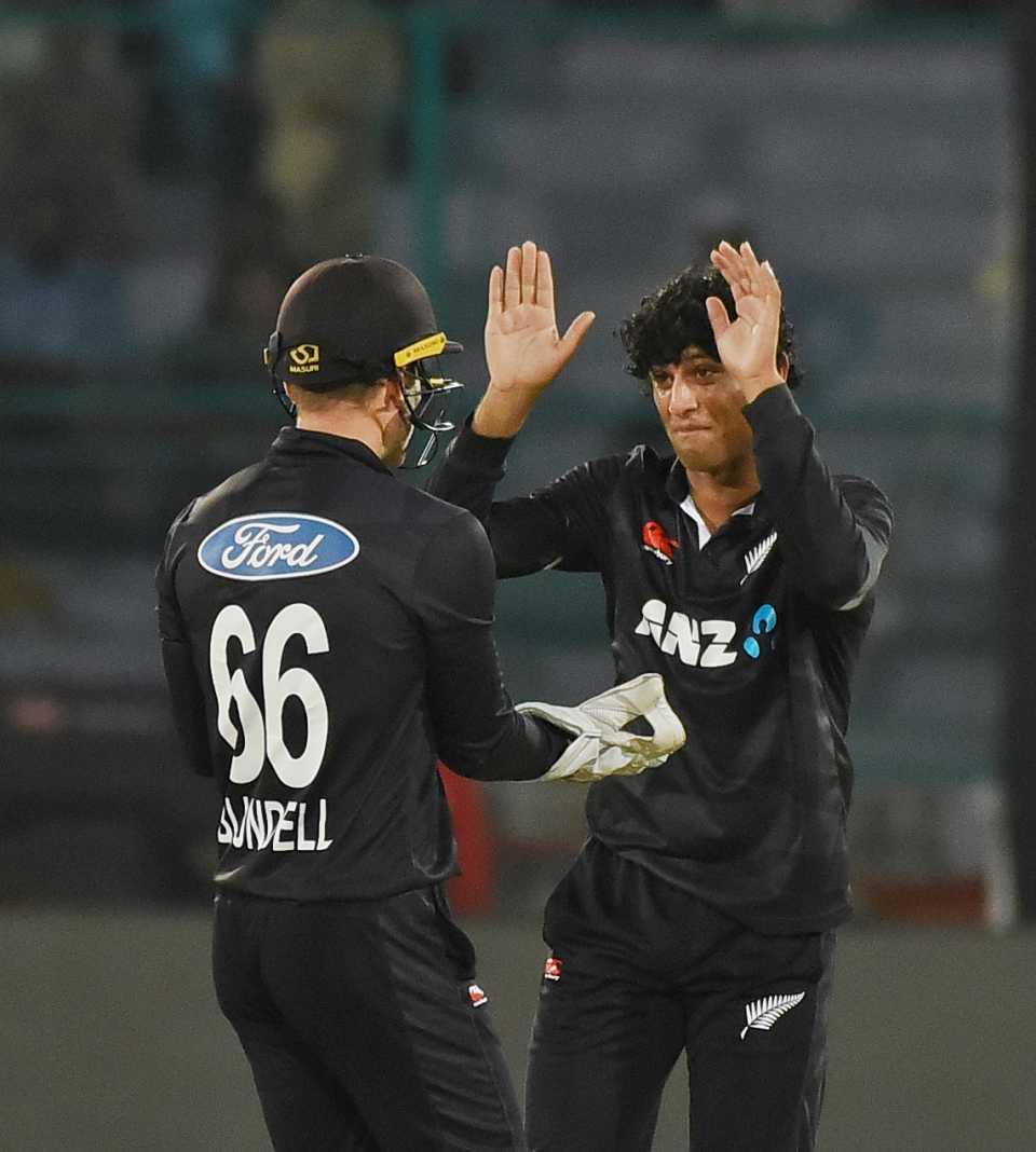 Rachin Ravindra celebrates after having Shaheen Afridi caught and bowled