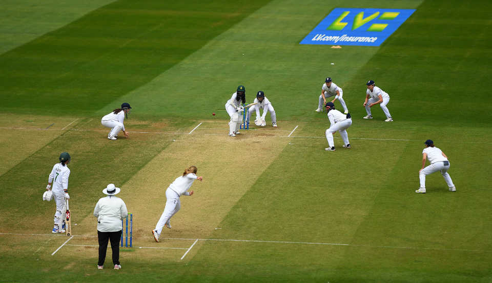 England's close-in fielders surround Tumi Sekhukhune as she faces a ball from Sophie Ecclestone