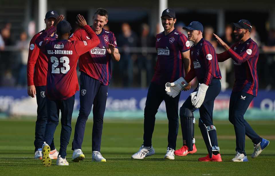 Michael Hogan celebrates with team-mates after taking the wicket of Chris Dent, Vitality Blast, Kent vs Gloucestershire, Canterbury, May 24, 2023