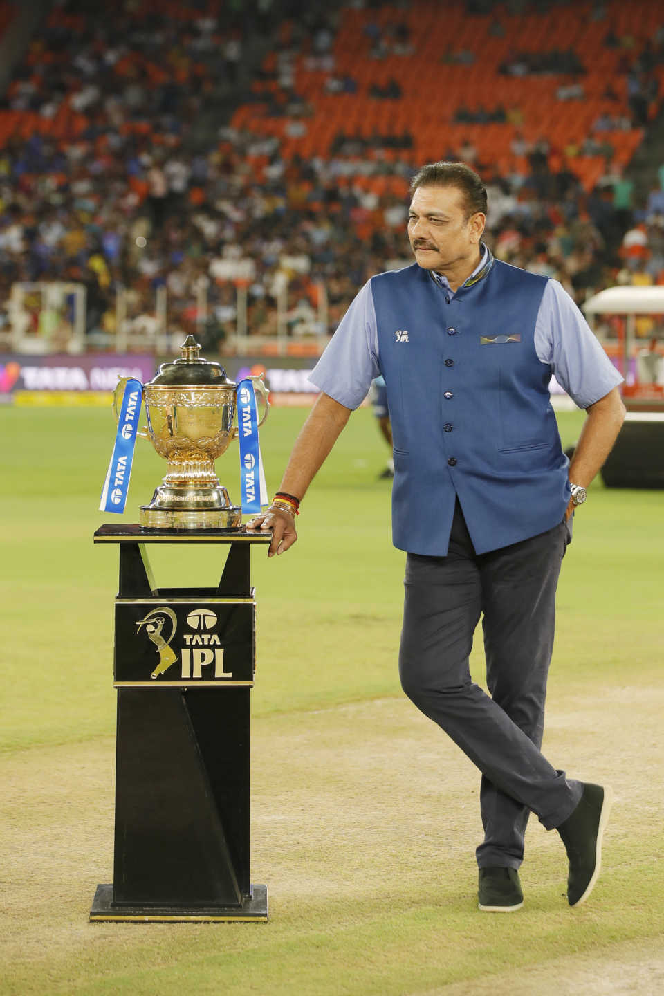 Ravi Shastri strikes a pose with the IPL trophy