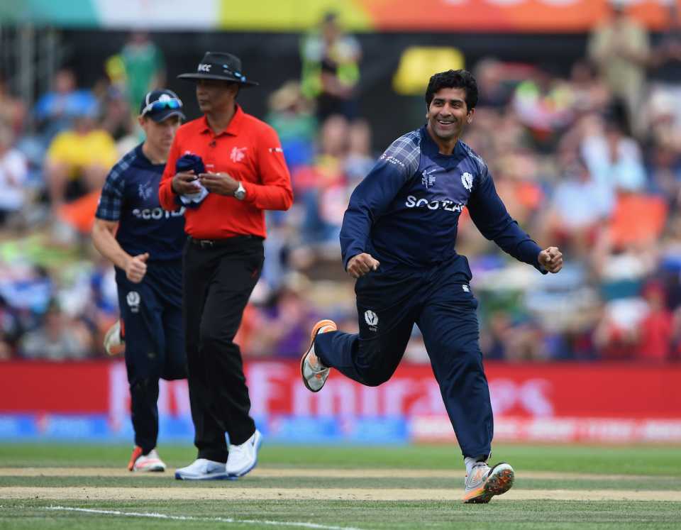 Majid Haq celebrates getting the wicket of Moeen Ali