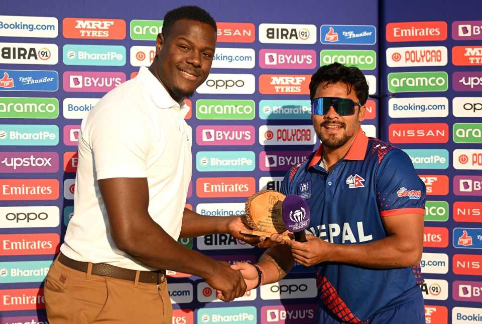 Karan KC receives the Player-of-the-Match award from Carlos Brathwaite, Nepal vs USA, ICC World Cup Qualifier, Harare, June 20, 2023
