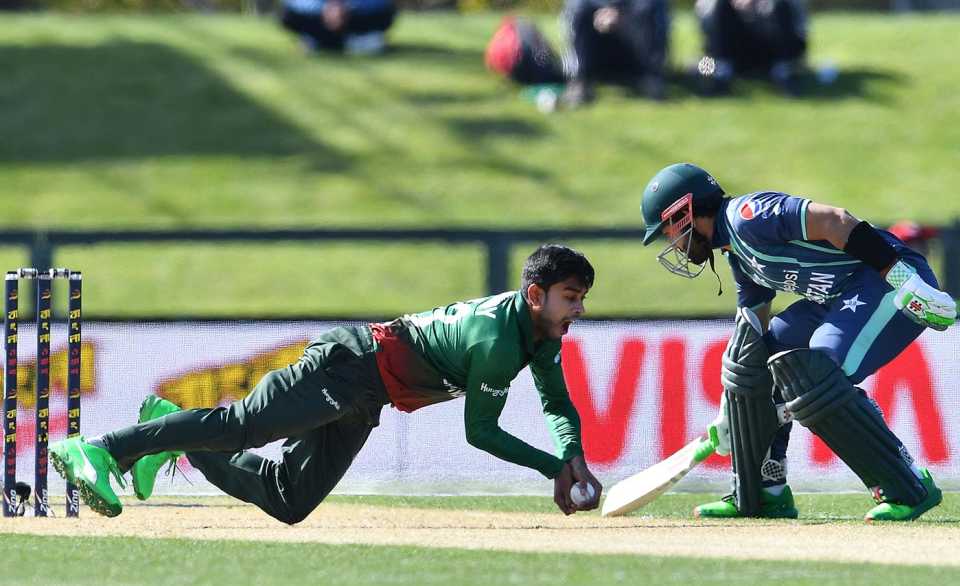 Mehidy Hasan Miraz looks to stop the ball while non-striker Mohammad Rizwan stays in the crease, Bangladesh vs Pakistan, New Zealand T20I Tri-Series, Christchurch, October 7, 2022,
