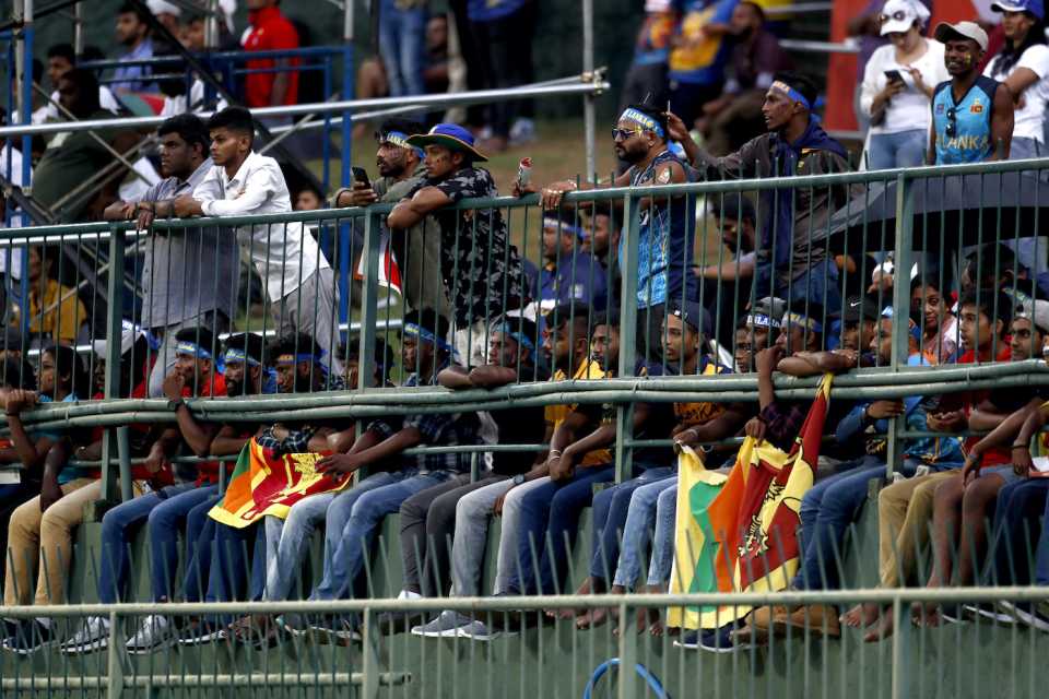 Sri Lankan fans watch the game in Pallekele