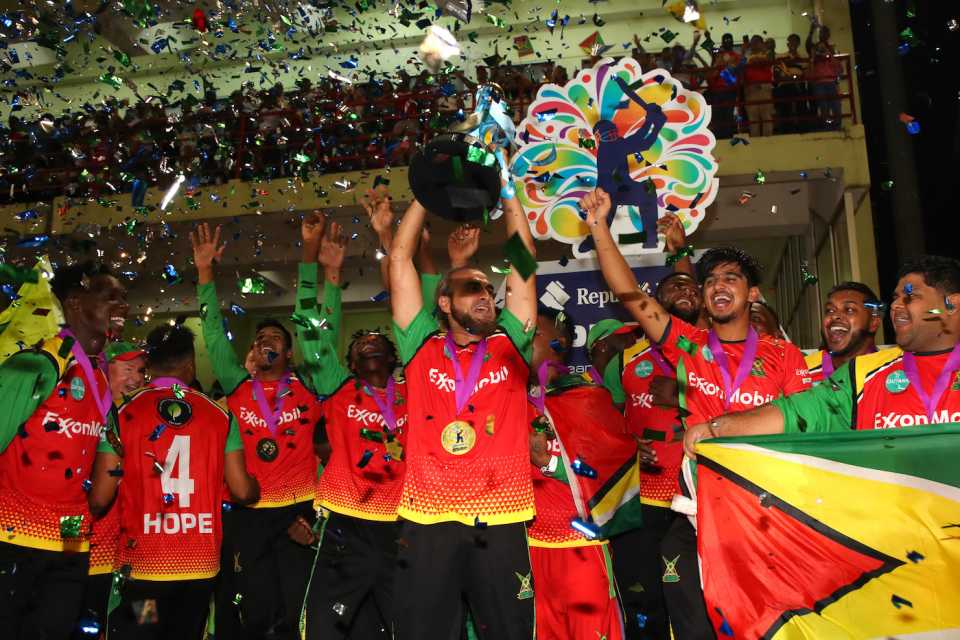 Imran Tahir lifts the CPL trophy with his team
