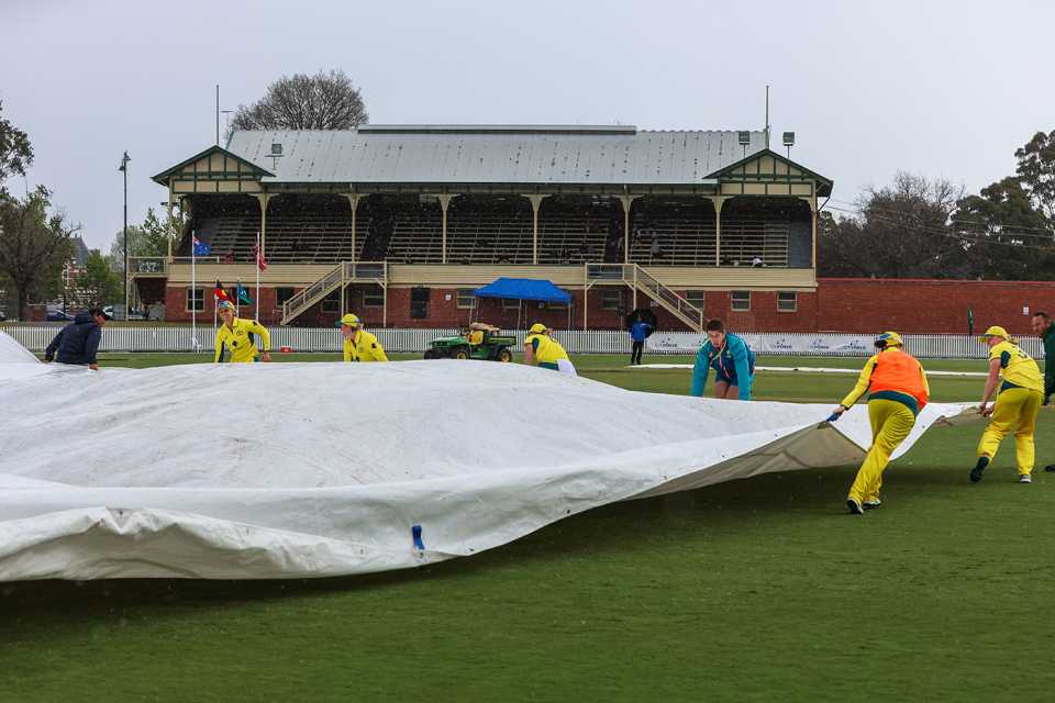 The Australia players and staff help with the covers, Australia vs West Indies, 2nd ODI, Junction Oval, October 12, 2023
