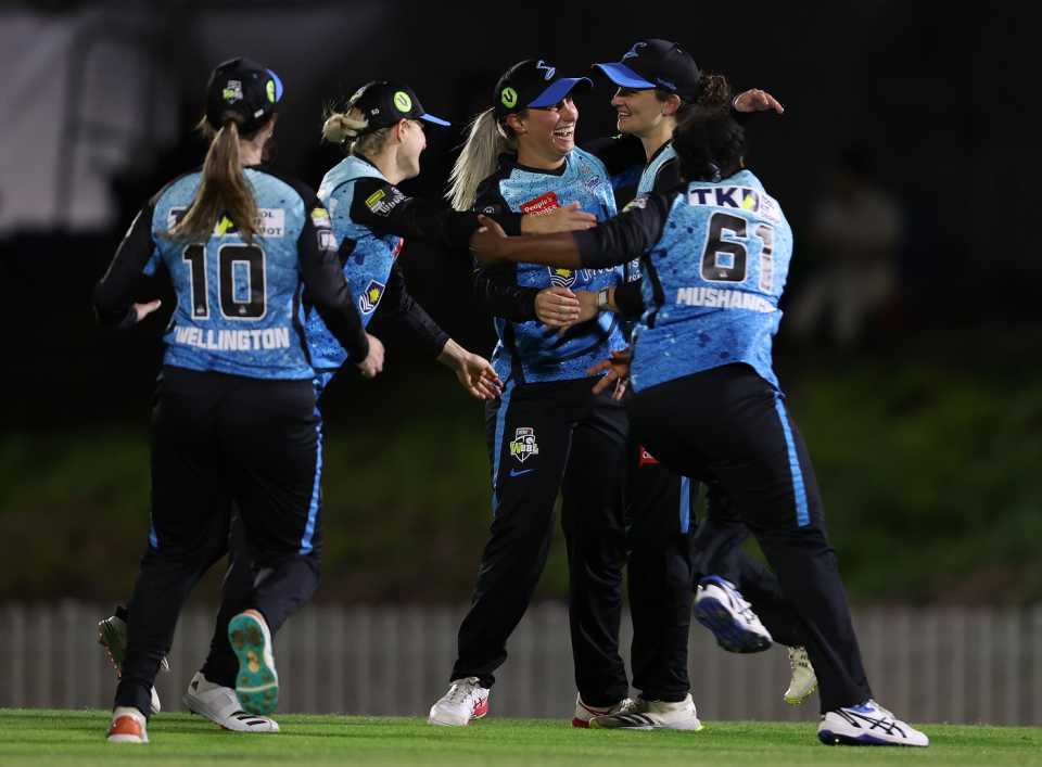Adelaide Strikers players celebrate 