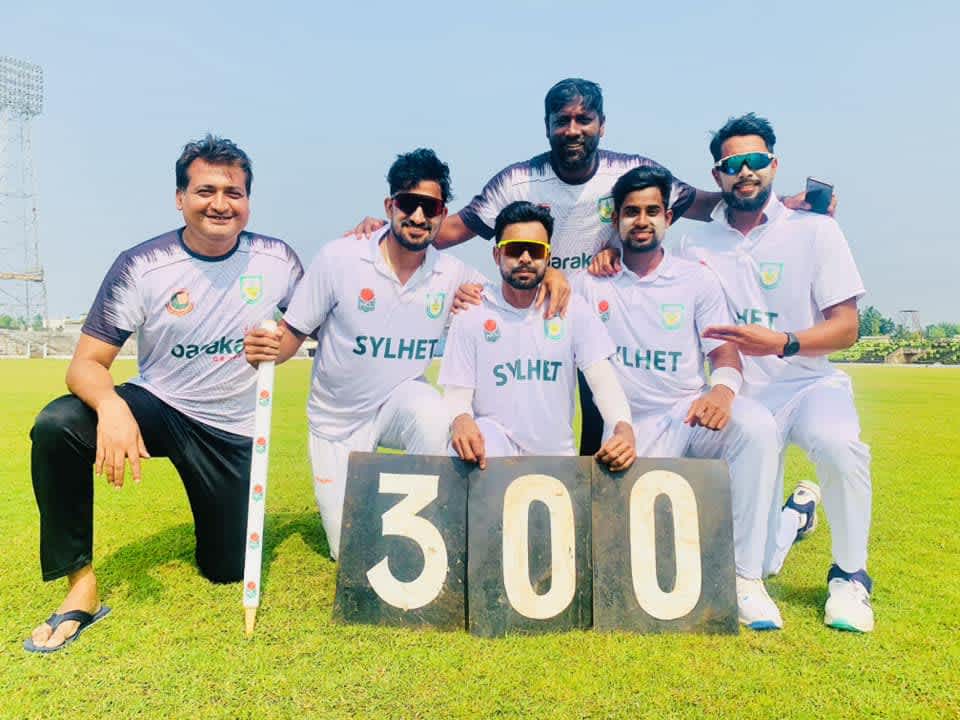 Abu Jayed celebrates his 300th first-class wicket with his team-mates