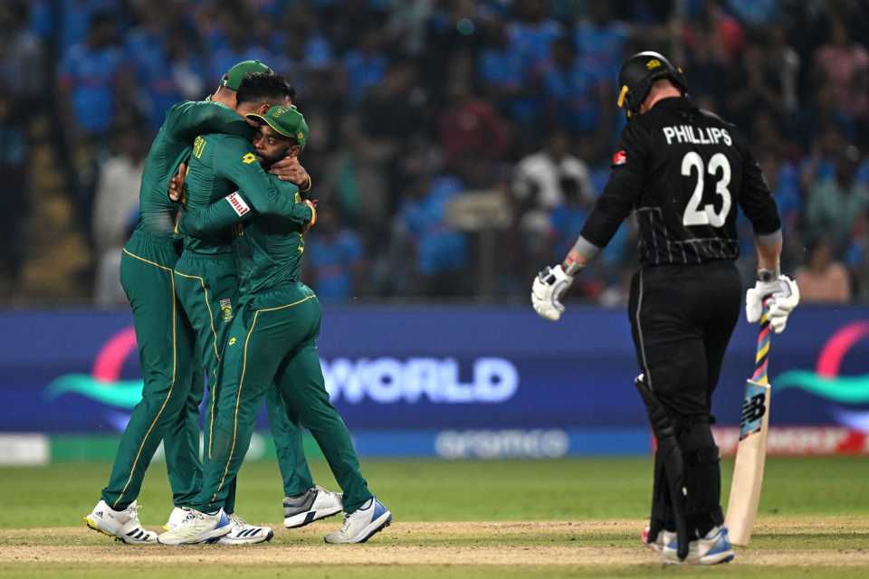 Aiden Markram, Keshav Maharaj and Temba Bavuma celebrate Daryl Mitchell's wicket, New Zealand vs South Africa, ODI World Cup 2023, Pune, November 1, 2023