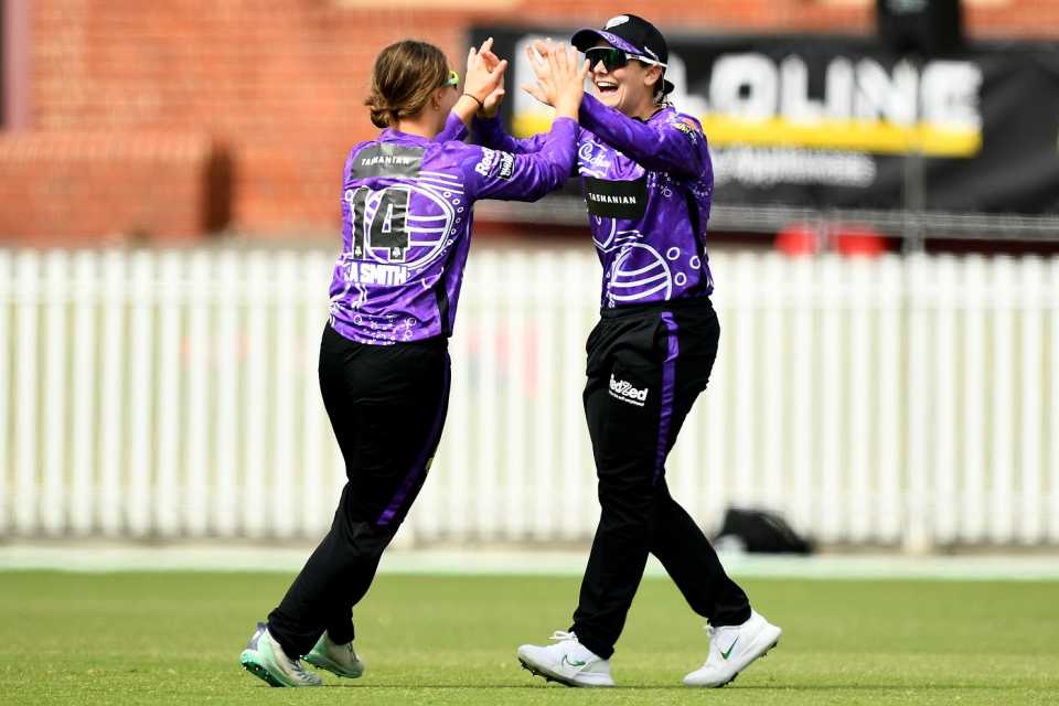 Heather Graham and Amy Smith celebrate the fall of a wicket, Melbourne Renegades vs Hobart Hurricanes, WBBL 2023, Melbourne, November 19, 2023 